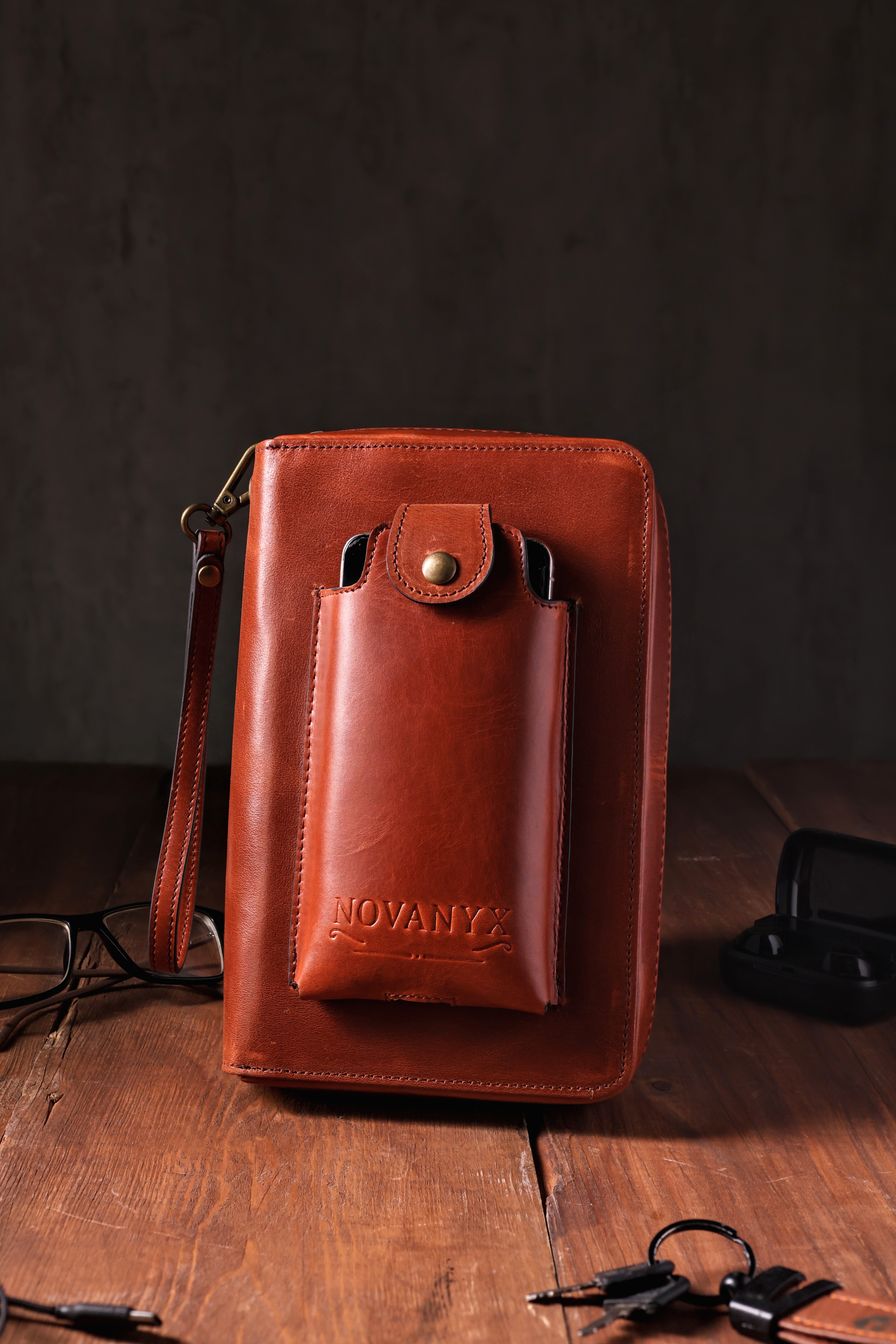 Premium brown leather crossbody bag with front pocket detail